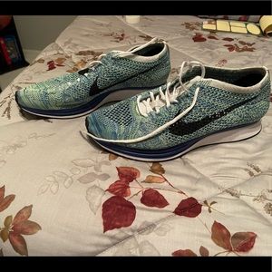 Nike flyknit racer size 10. Pre owned.